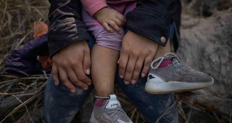 Hands and feet of young child